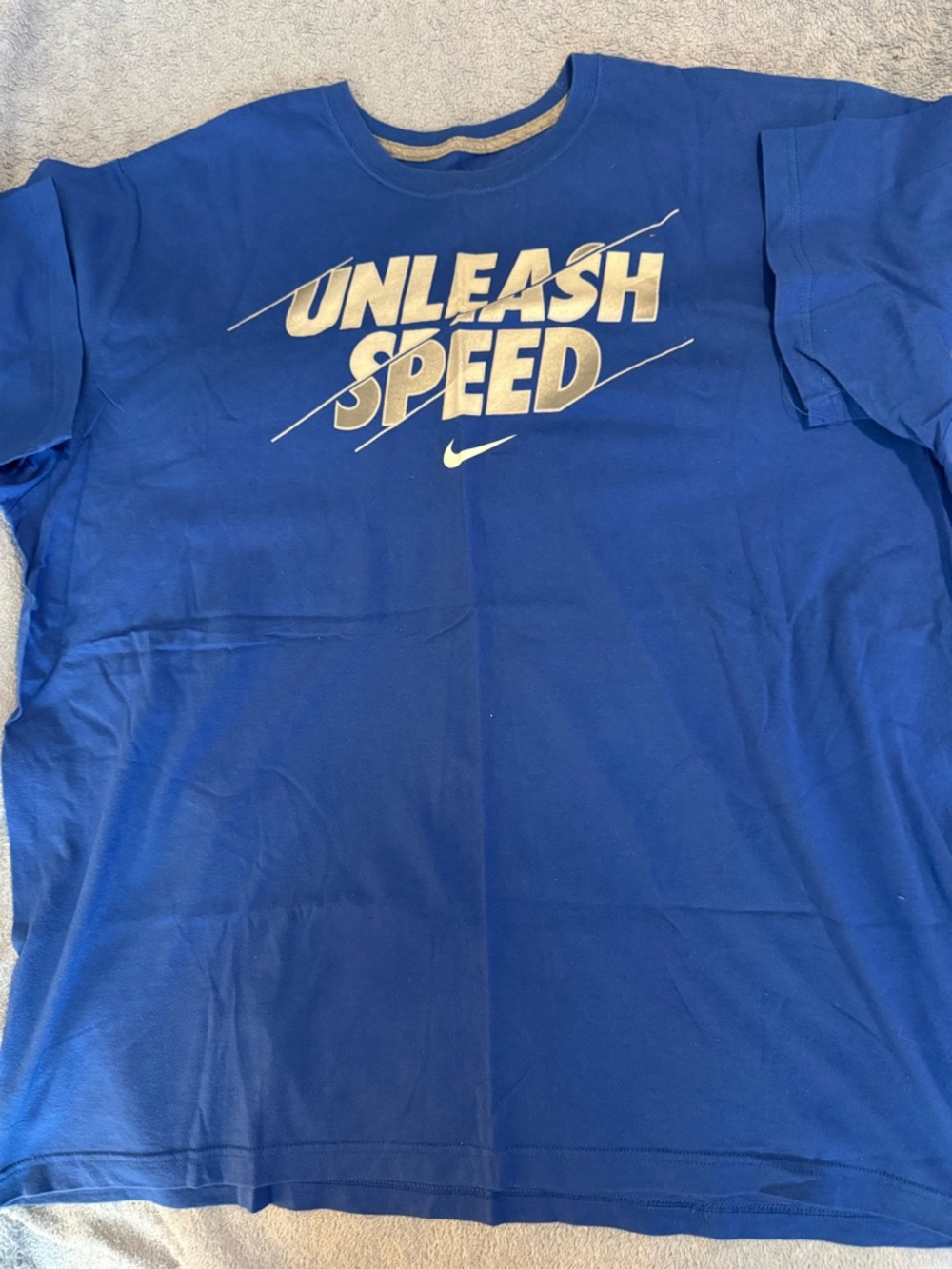 Nike Men’s Royal Blue “Unleash Speed” Short Sleeve Tee